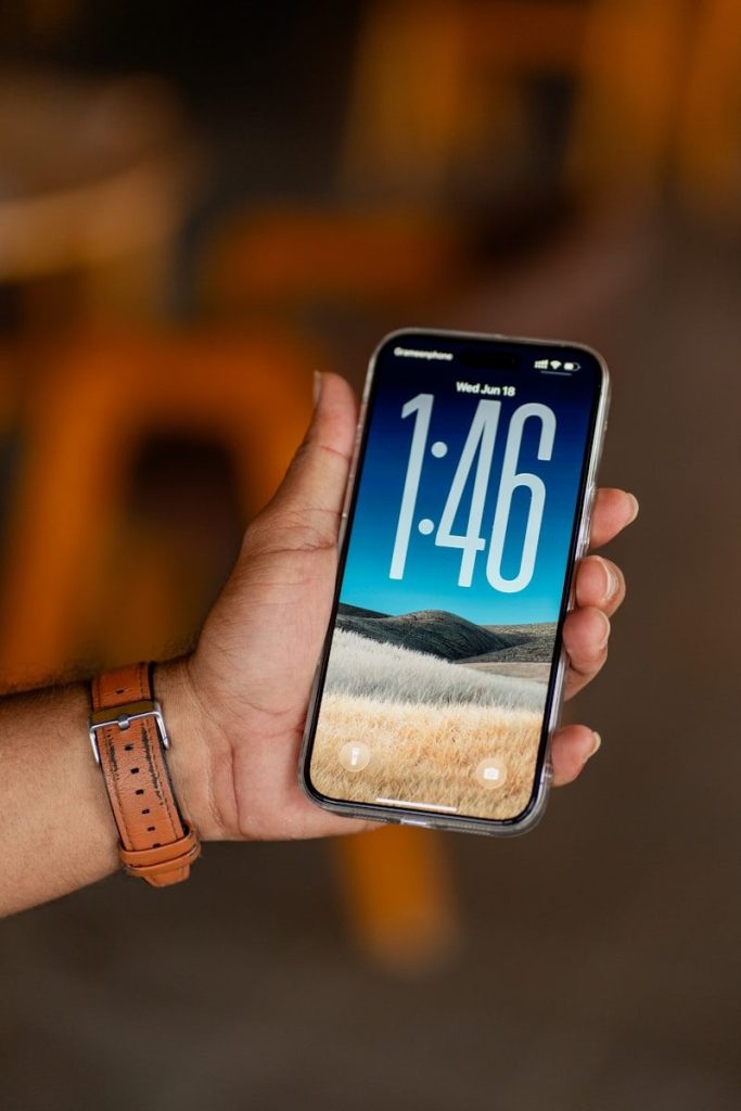 A person is holding an iphone.