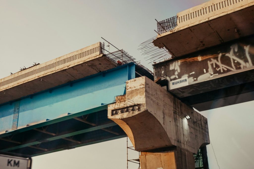 broken brown concrete bridge