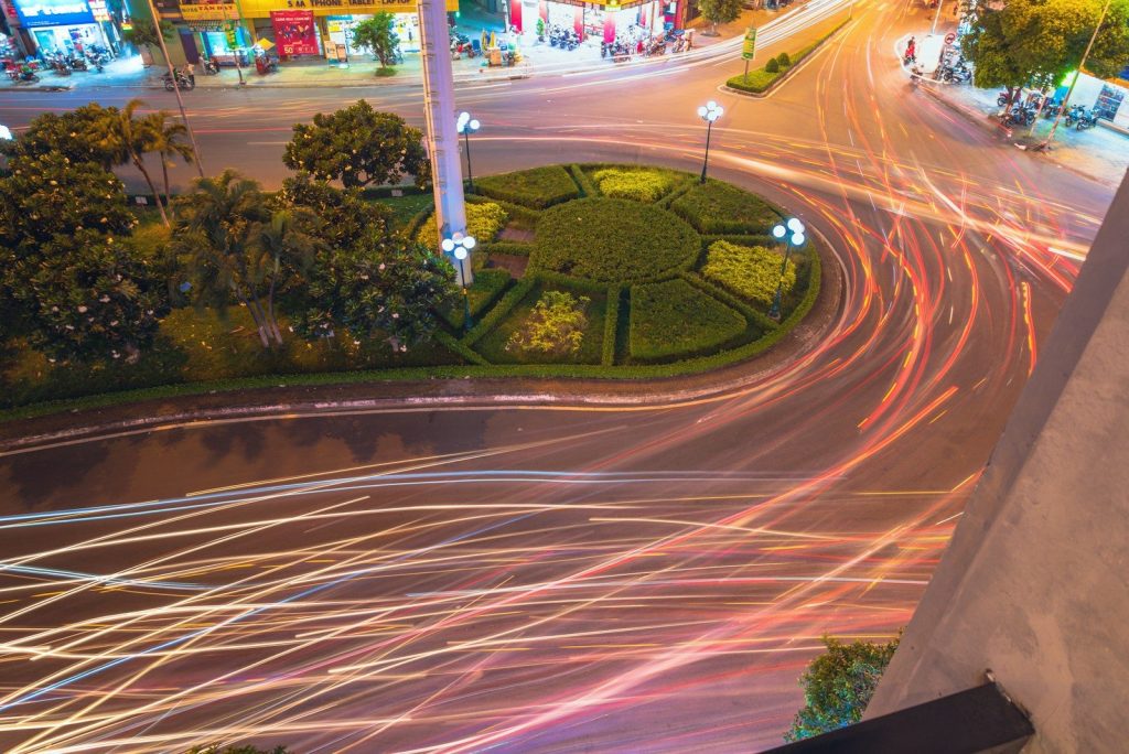 a city street at night with long exposure