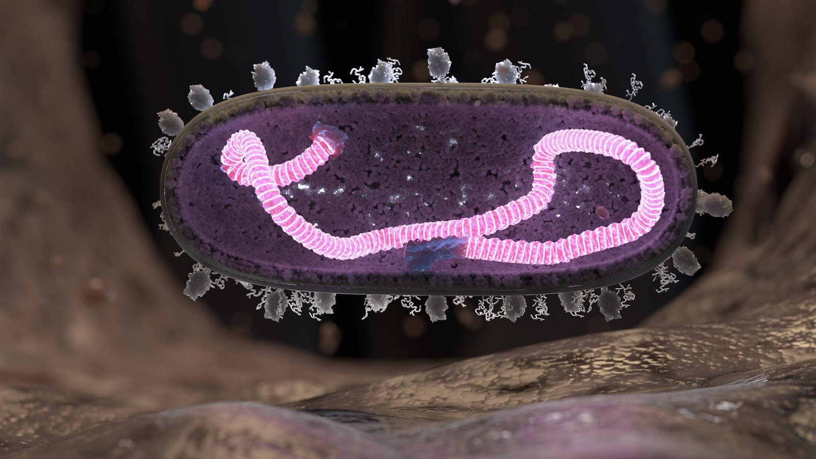 a picture of a cell phone with a pink ribbon on it