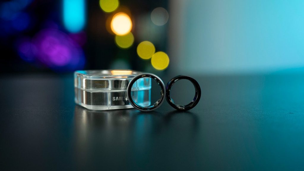 An oura ring and charging case are shown.