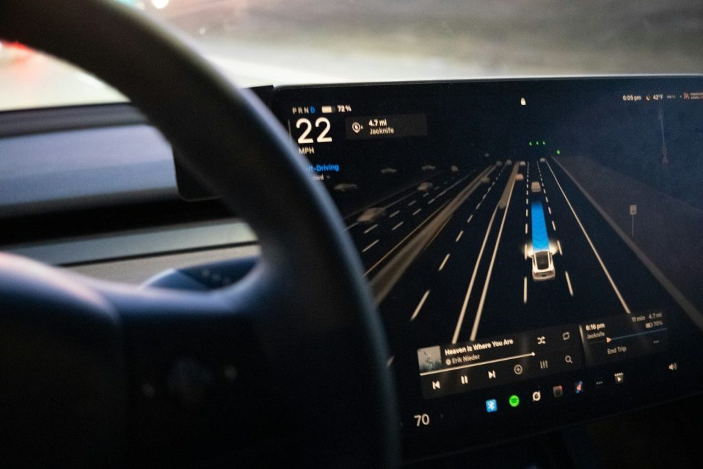 Car dashboard displaying autonomous driving interface
