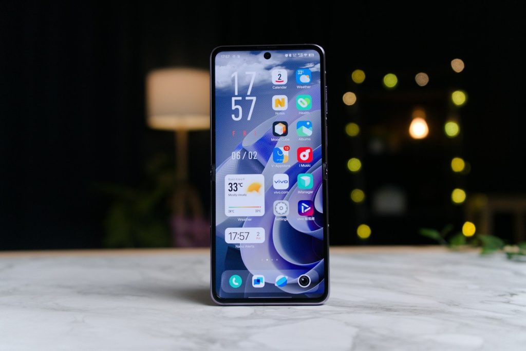 a close up of a cell phone on a table
