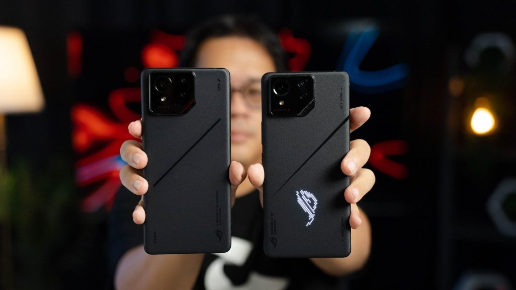 A woman holding two samsung phones in her hands