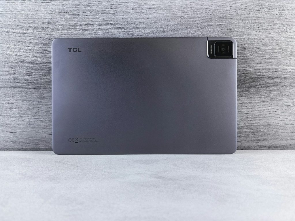 a laptop computer sitting on top of a table
