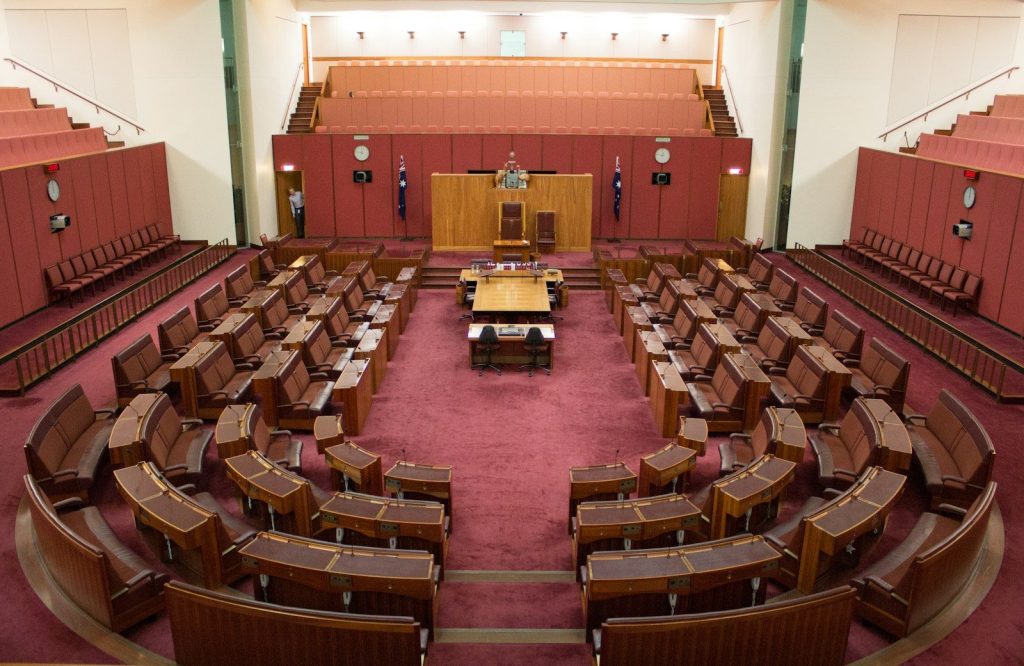 a large room filled with lots of wooden furniture