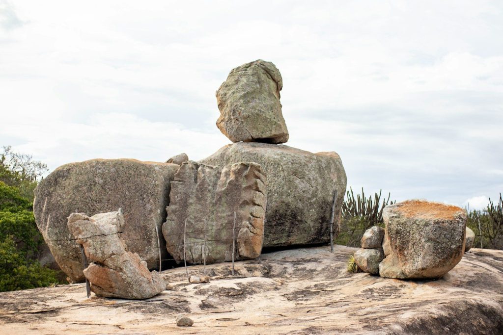 a large rock formation on top of a mountain