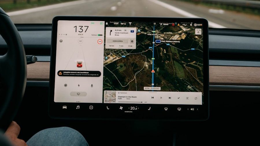 person holding white ipad inside car