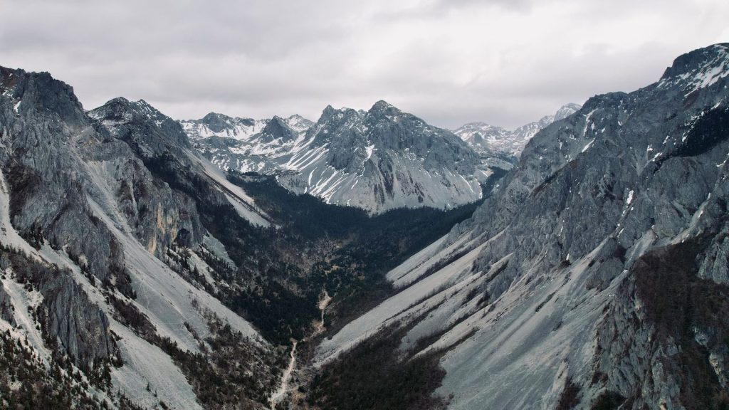 Dramatic mountain range with a valley below