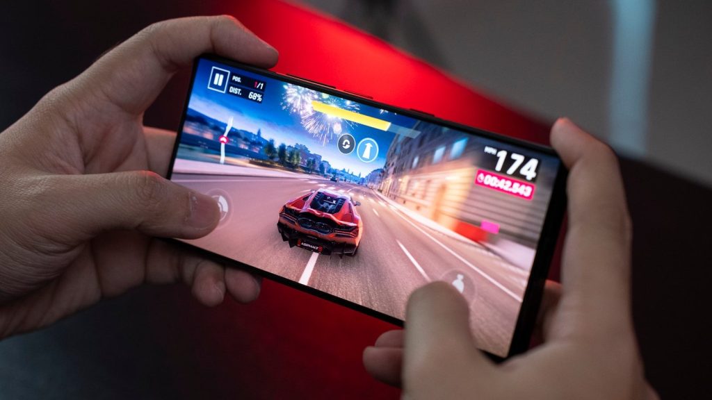 A person playing a game on a cell phone