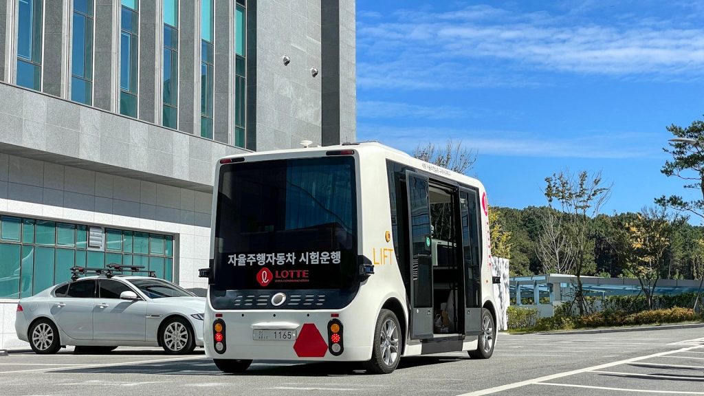 a bus and a car on a road