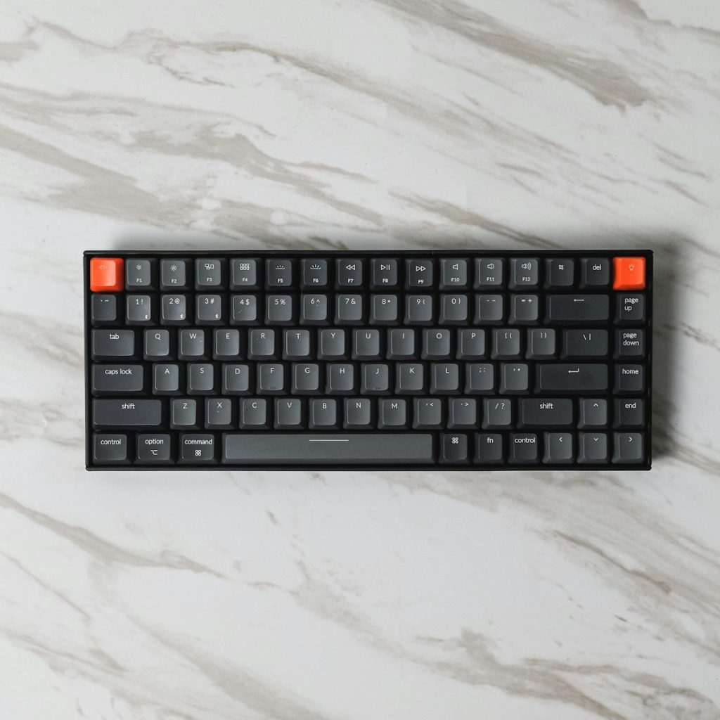 black and orange computer keyboard