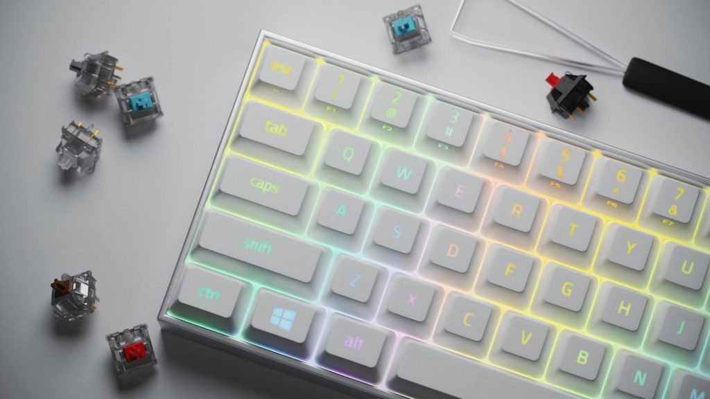 a computer keyboard with a glowing key board