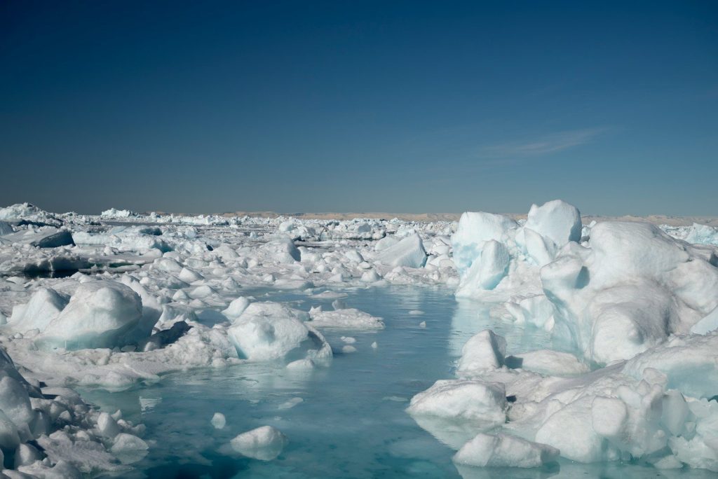 Icy arctic landscape with a clear blue sky
