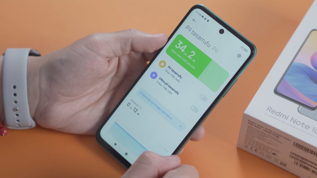 a person holding an iphone in their hand