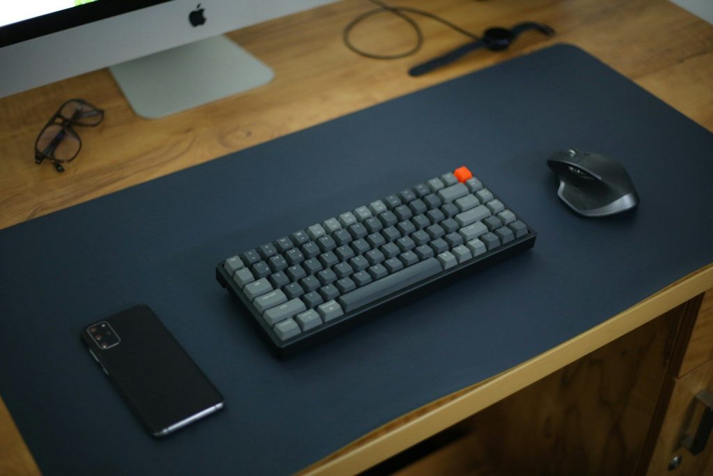 black iphone 7 on black wooden table