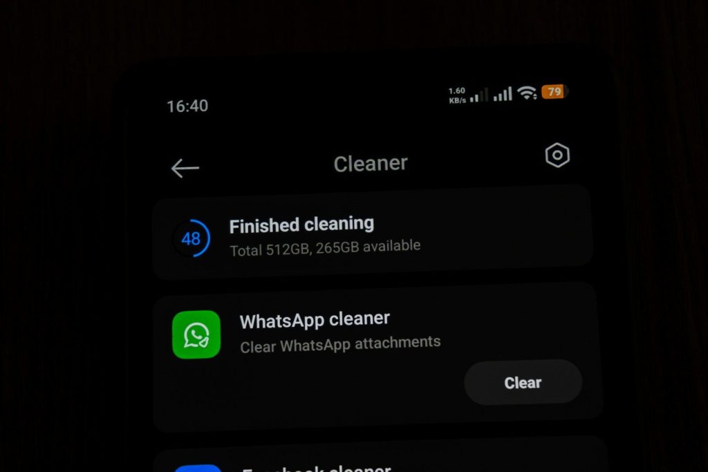Phone cleaner app showing finished cleaning and whatsapp cleaner.