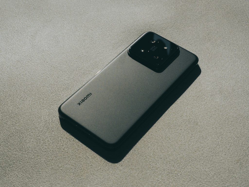 a close up of a cell phone on a surface