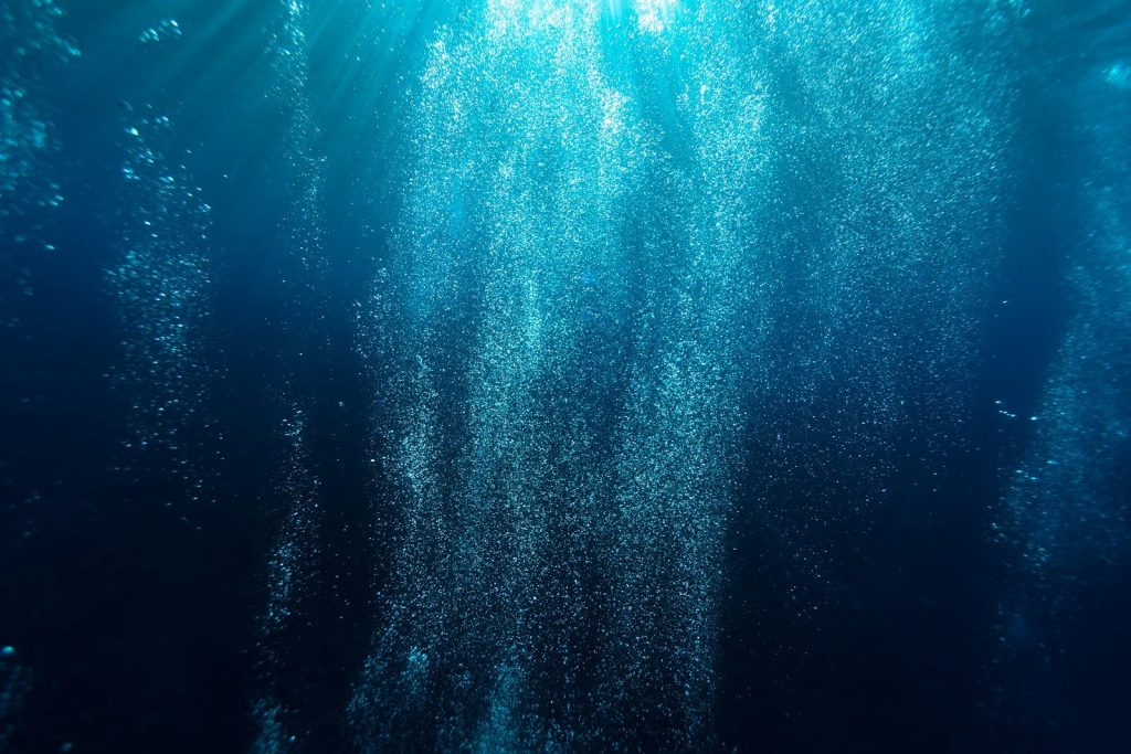 photography of blue water