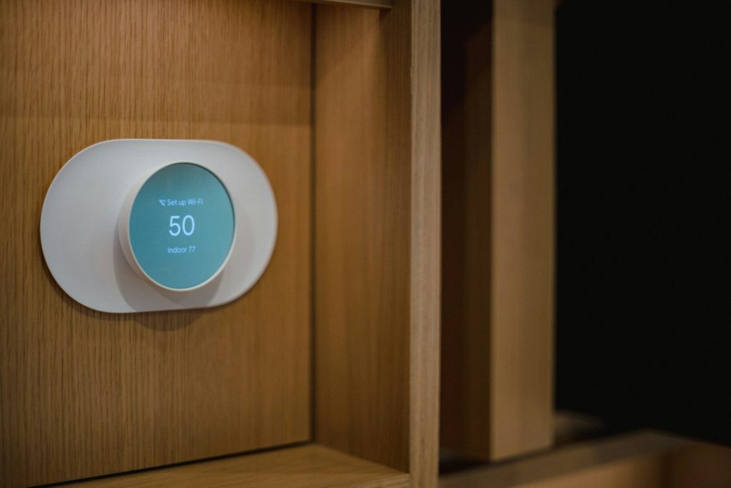 a close up of a thermostaer on a wall