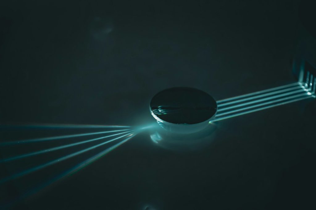 Light rays bending through a glass lens