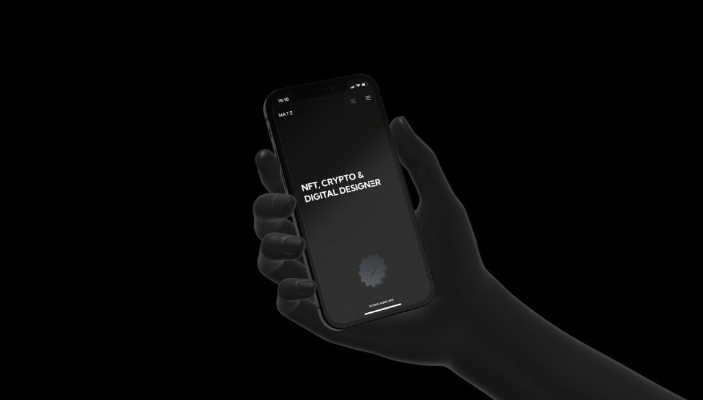 a person holding a cell phone in their hand