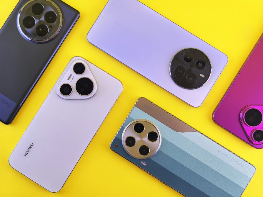 Several smartphones of varying colors are displayed.