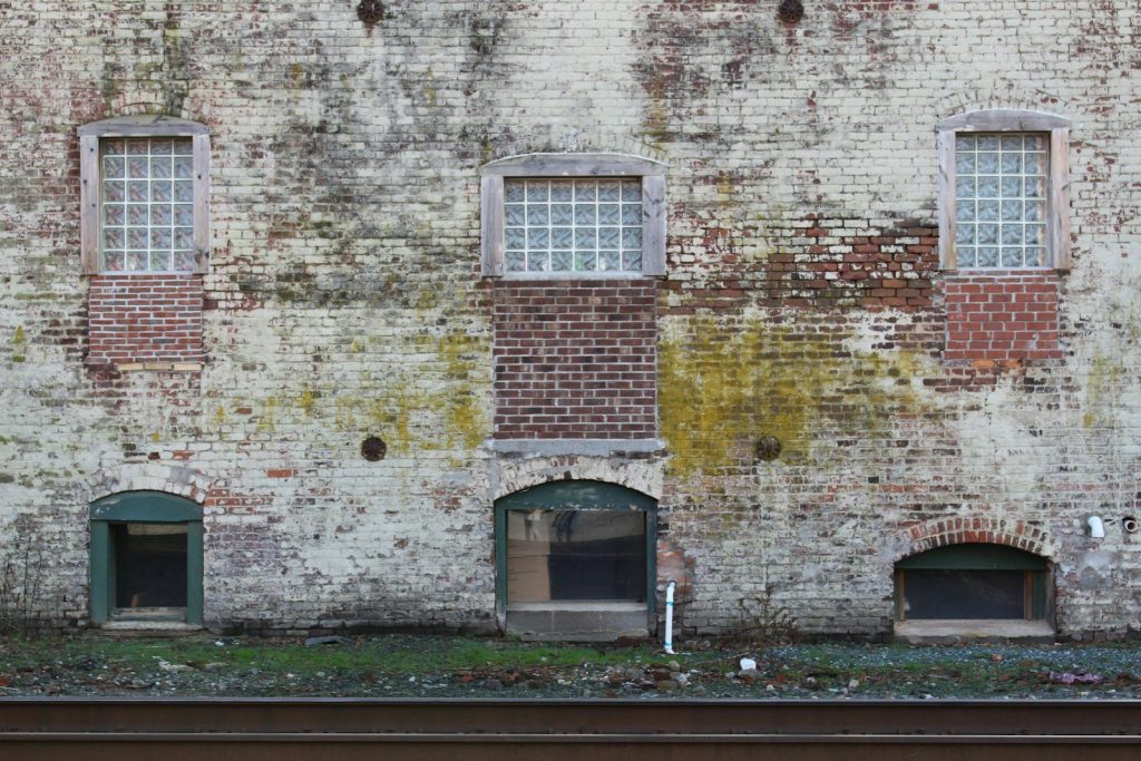 brown brick building with window
