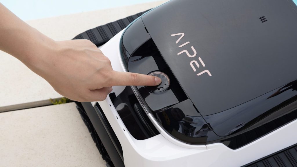 Someone is turning on a pool cleaning robot.