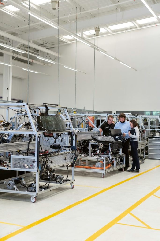 engineers working in automotive factory