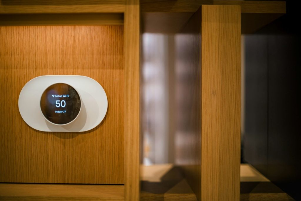 a wooden room with a clock on the wall