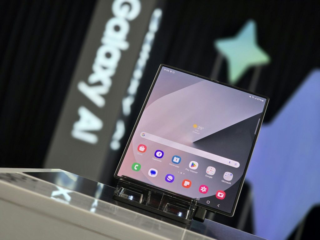 A person standing at a podium with a laptop on it