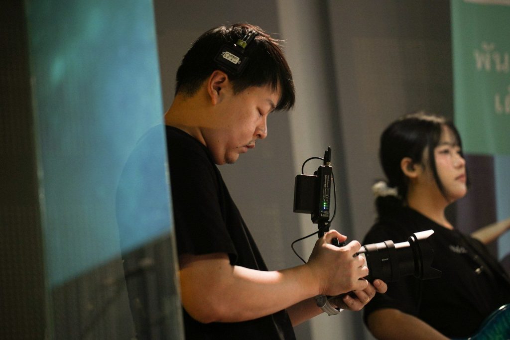 Man with headphones and recording equipment