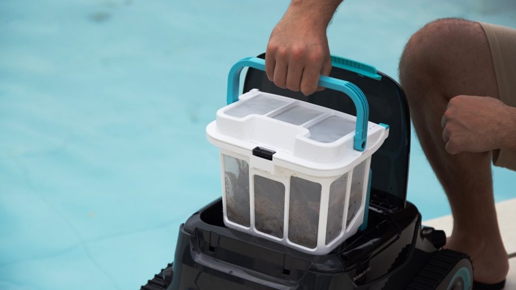 Someone is removing a pool filter.