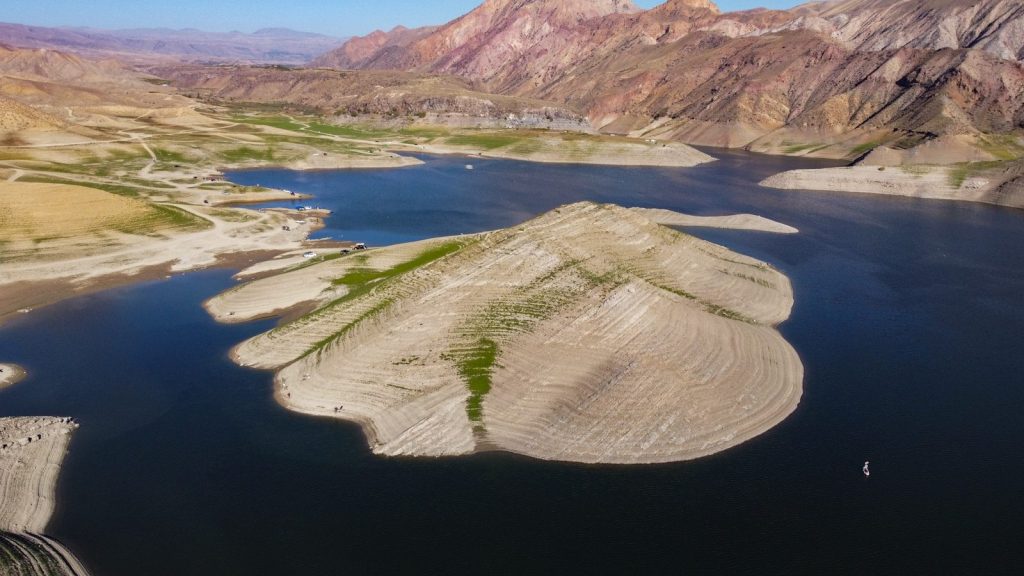 Aerial view of a large island in a blue lake
