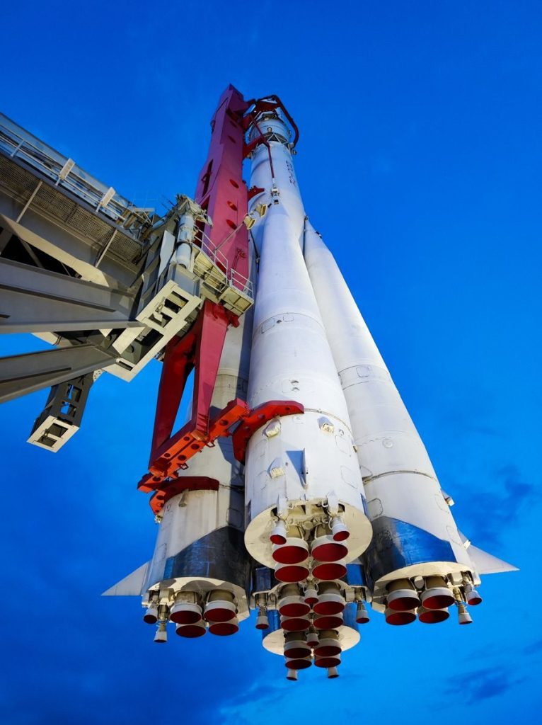 Low angle view of a space rocket at a launch pad against a clear blue sky in Moscow.