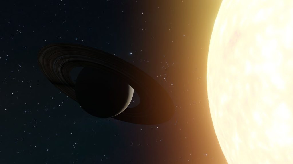 A ringed planet silhouetted against a bright star in outer space.