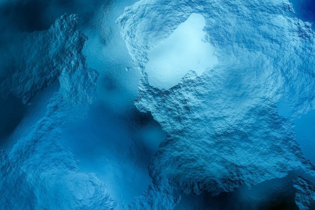 A stunning abstract image showcasing textures in vivid blue tones, resembling water.
