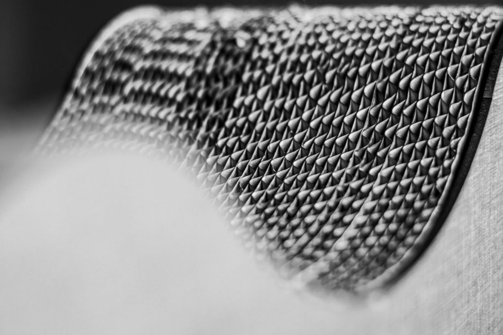 Black and white close-up of textured geometric pattern in Buenos Aires, Argentina.