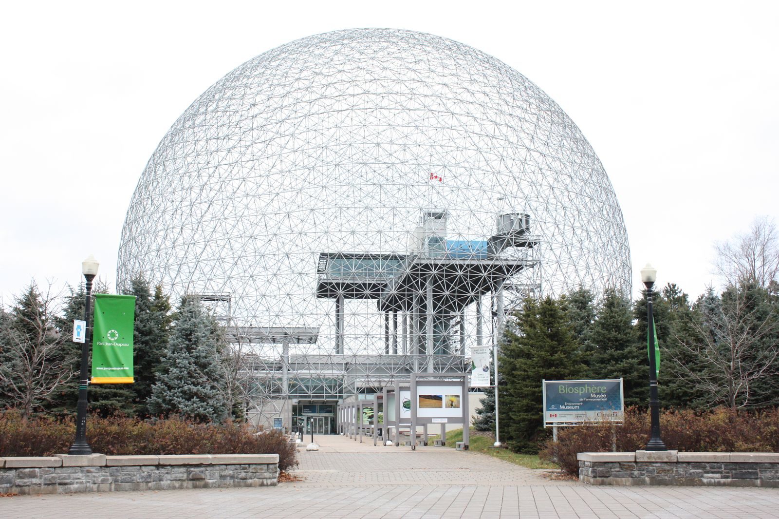 Front view of the Montreal Biosphere during winter, showcasing its iconic geodesic dome design.