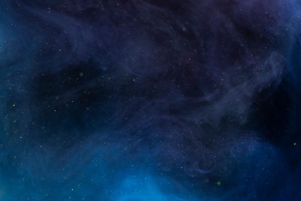 A mesmerizing view of the starry night sky with a cosmic nebula effect, enhancing the celestial ambiance.
