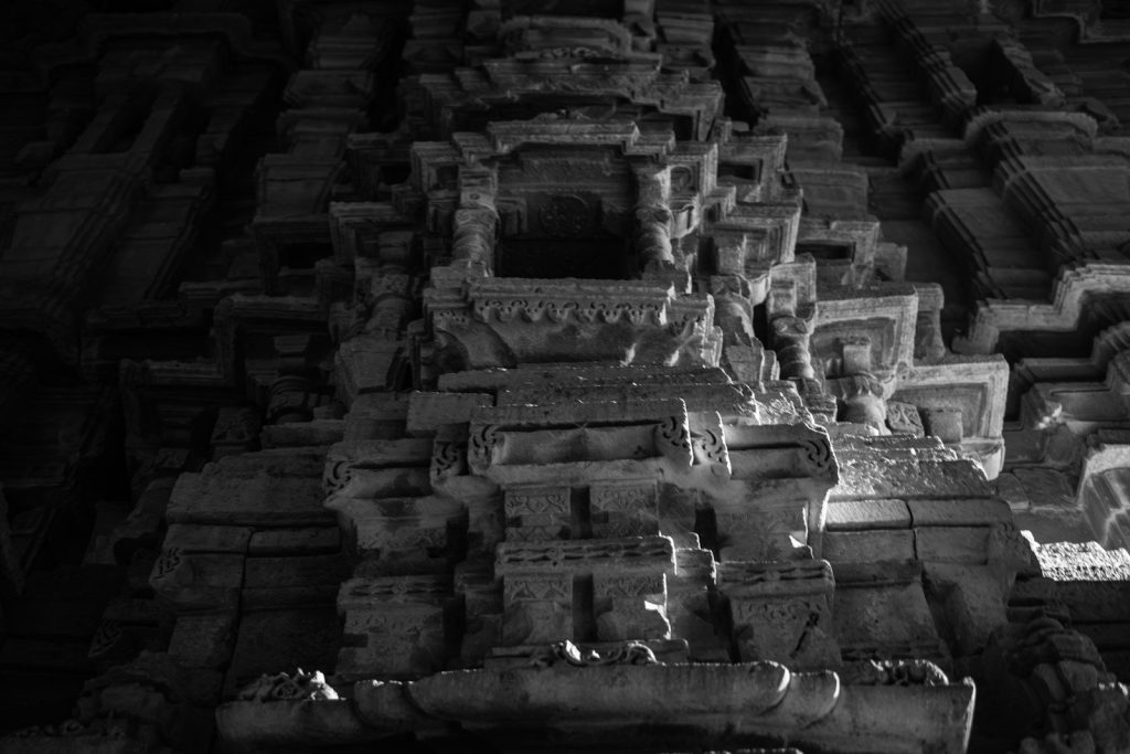 Intricate stone carvings on an ancient temple wall