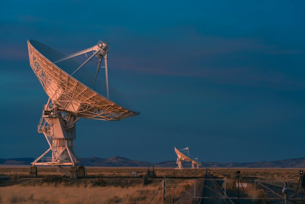 a large metal structure in a field