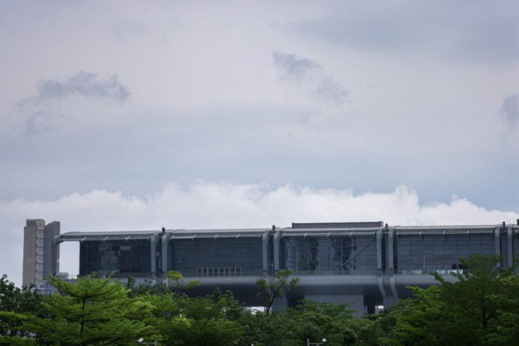 a large building with a lot of windows on top of it