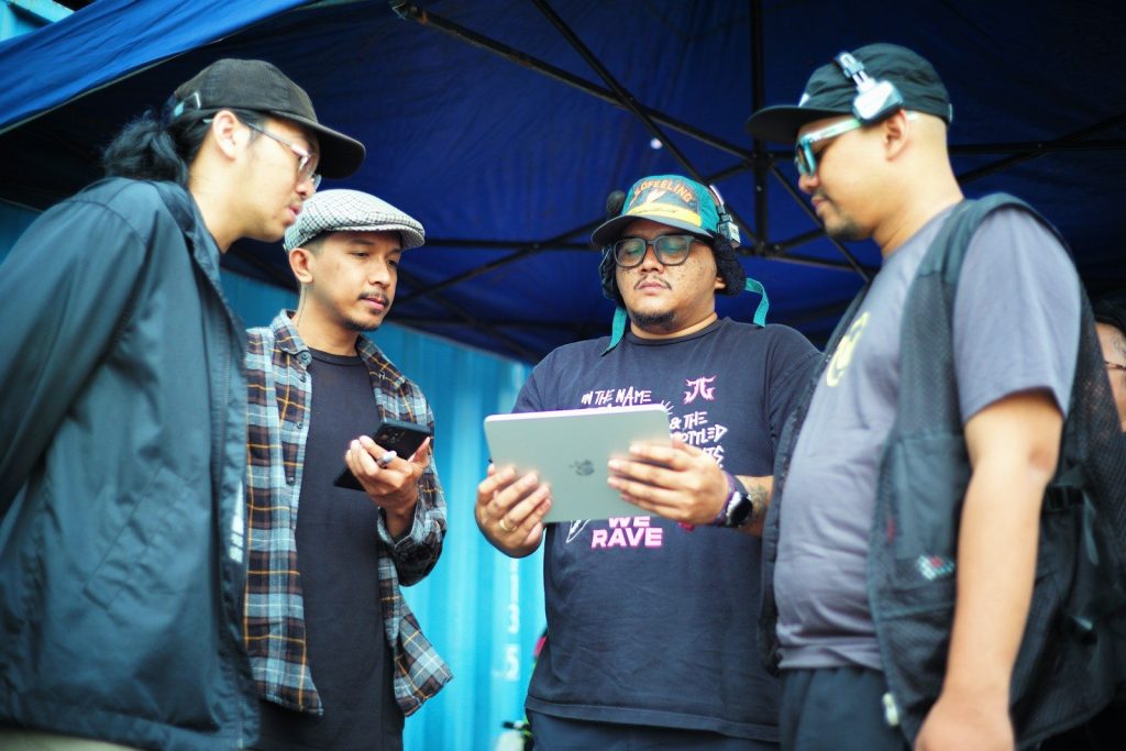 A group of men standing next to each other