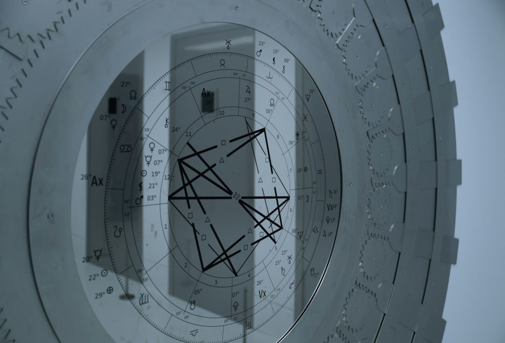 a close up of a clock on a wall
