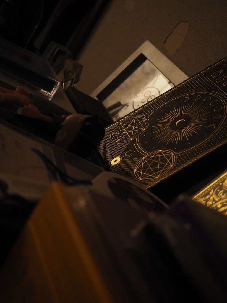 a box with a pentagram on it sitting on a table