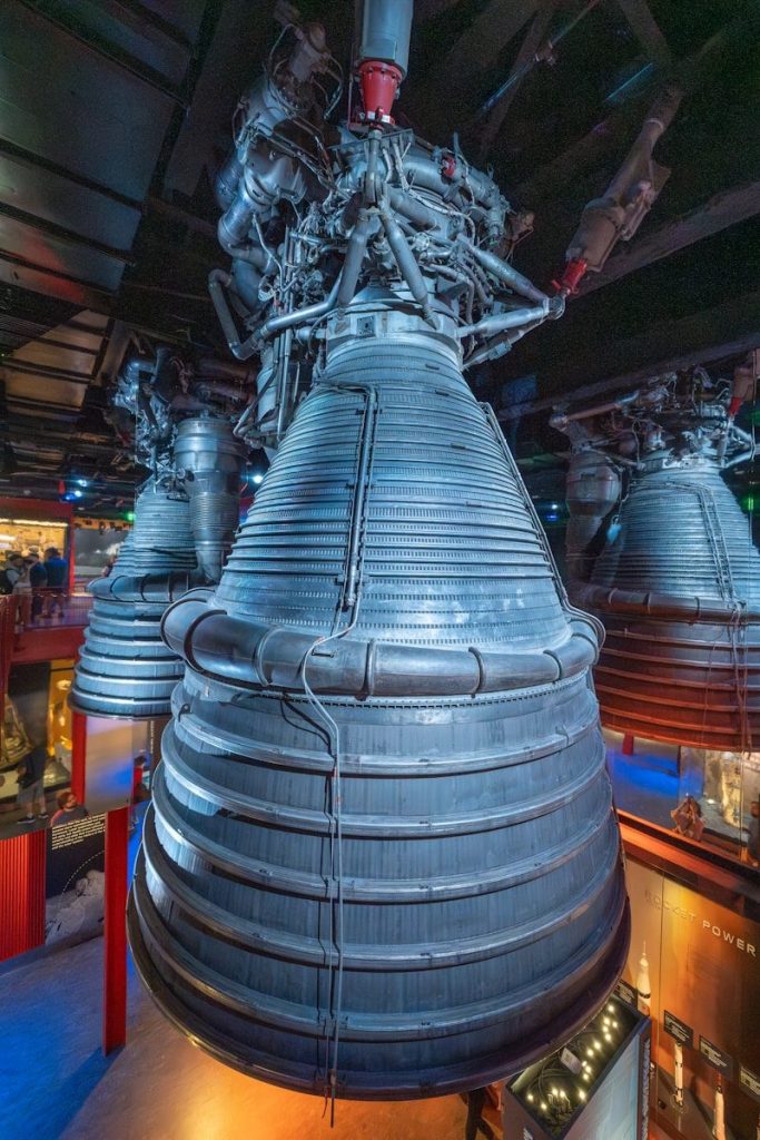 A very large metal object inside of a building