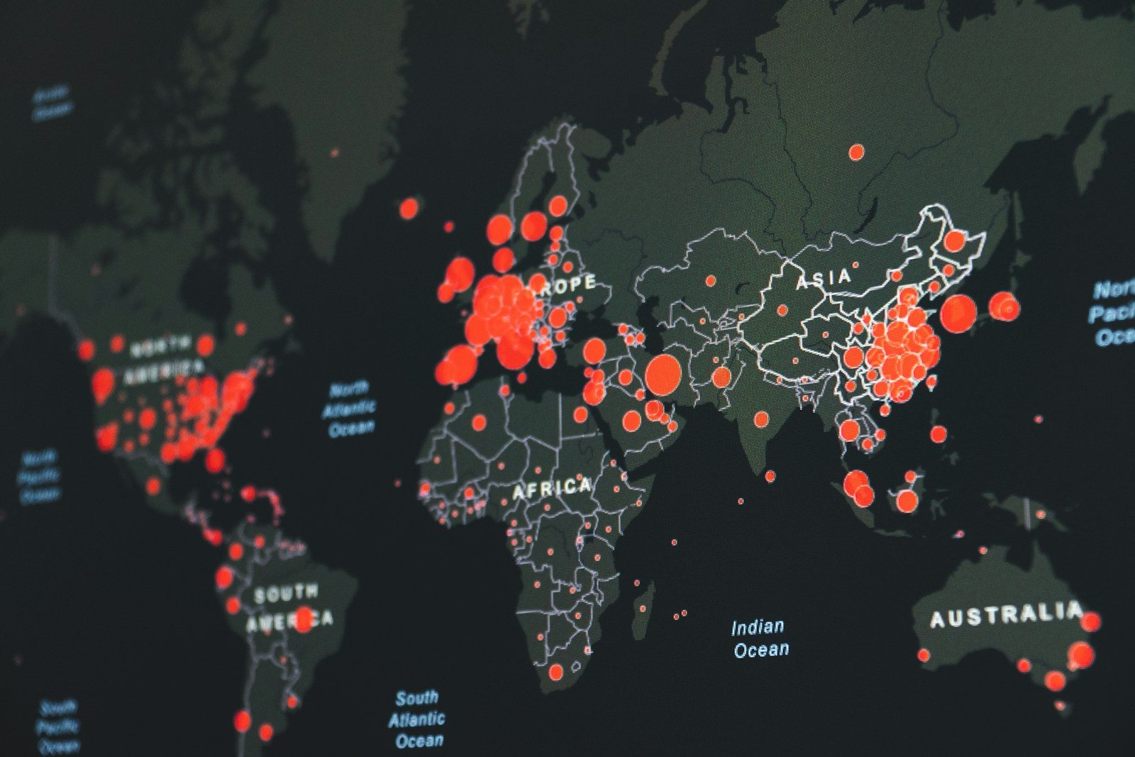 world map showing red infection clusters