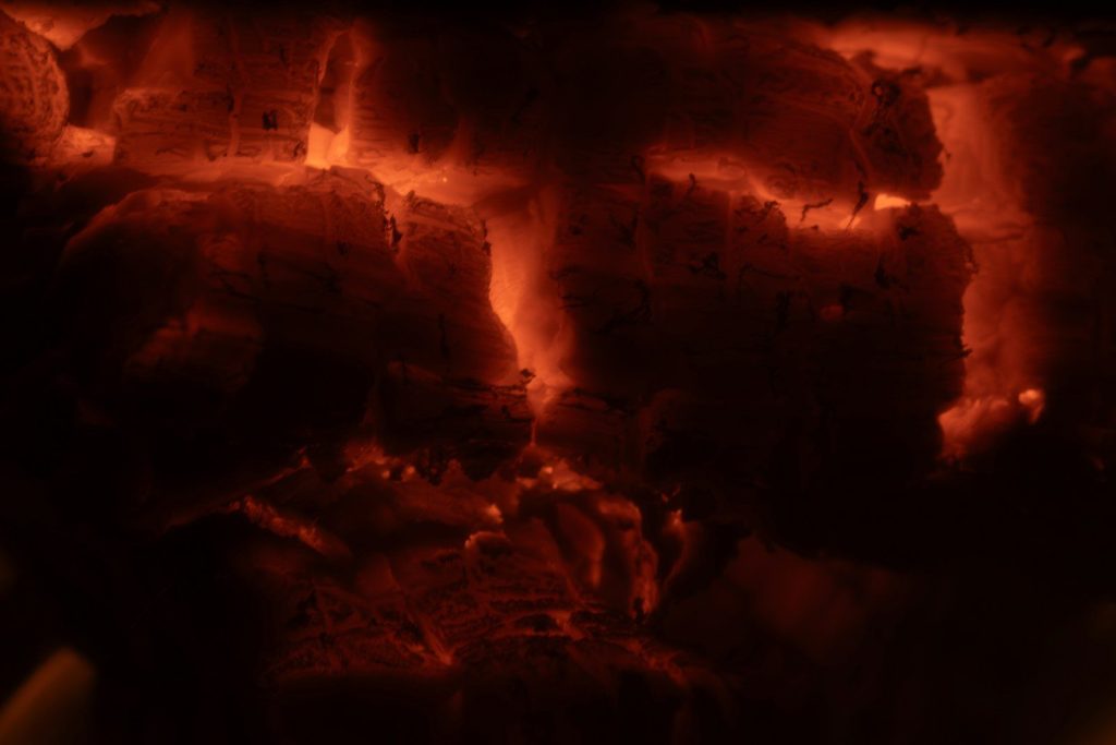 A close up of a fire in a fireplace